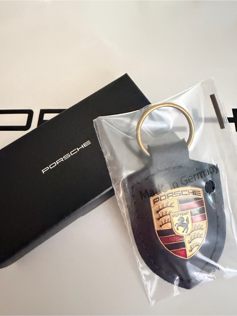 Authentic Porsche Design Black Leather Keyring with Gold